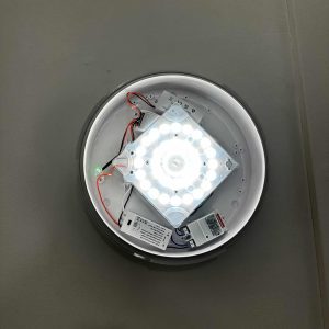 LED lighting fixture with wiring exposed, designed for modern property lighting solutions.