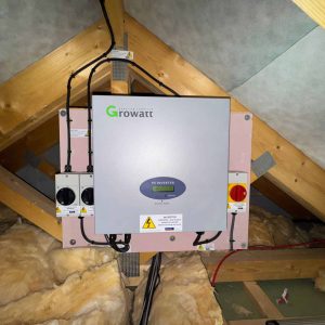 Electrical system upgrade with solar PV inverter in loft for efficient energy use.